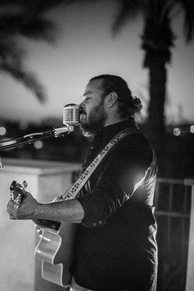 Crooner on a Rooftop Bar